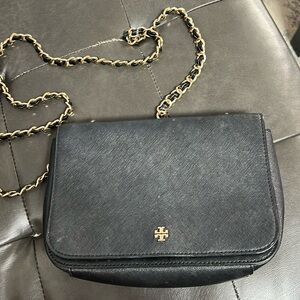 Black with gold details cross body Tory Burch purse in great condition